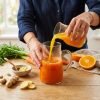 Pouring_juice_into_pitcher_202608270207 Pouring_juice_into_pitcher_202608270207